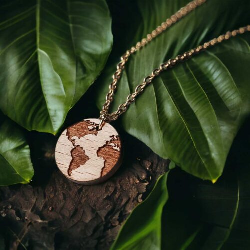 wooden necklace in the shape of the planet earth