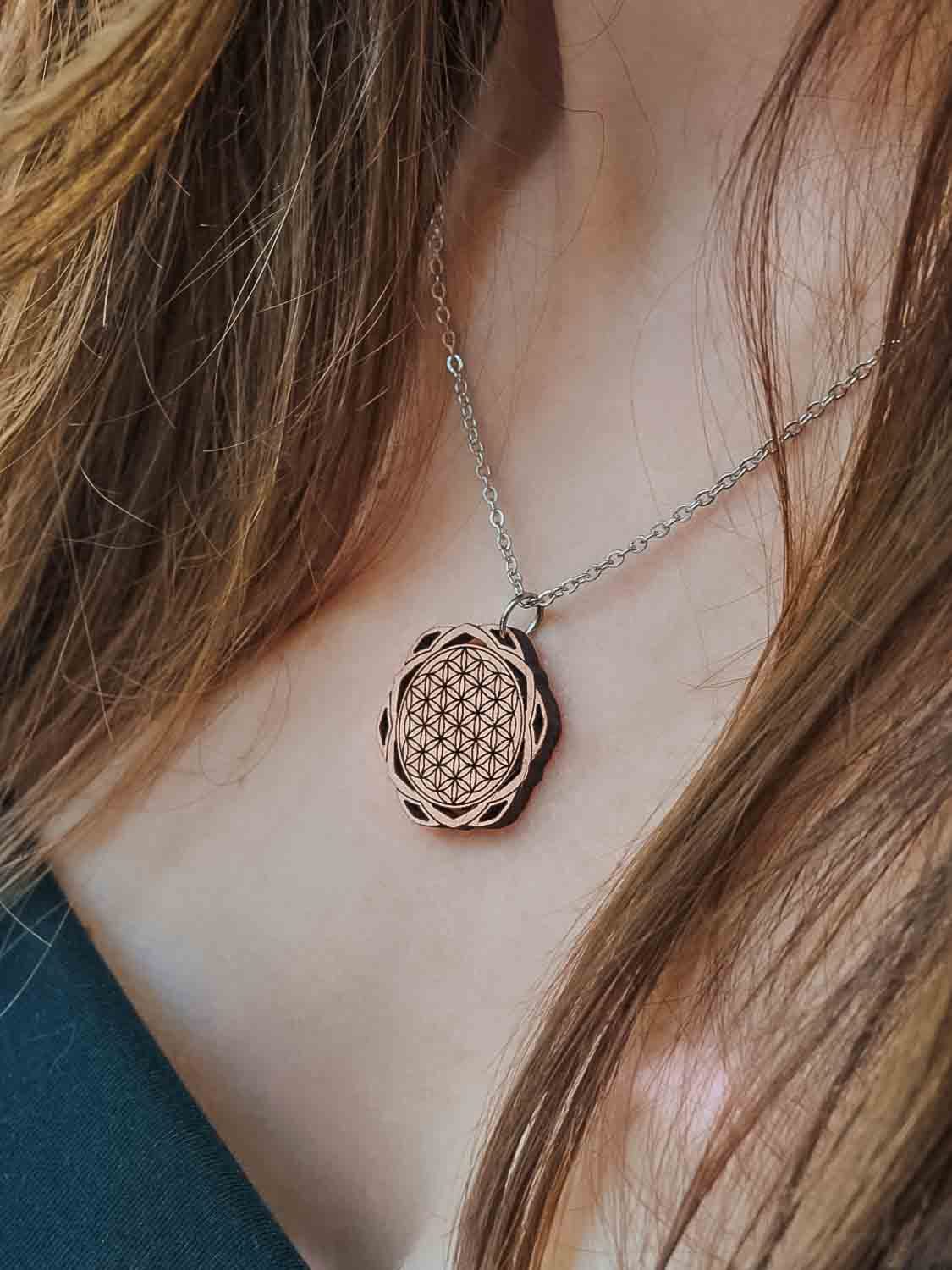 Wooden necklace with the symbol of the flower of life