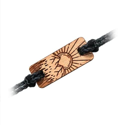 Wooden bracelet with mountain and sun motif