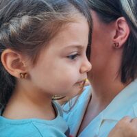 Swiss wooden ear studs in butterfly design