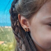 Swiss wooden ear studs in butterfly design