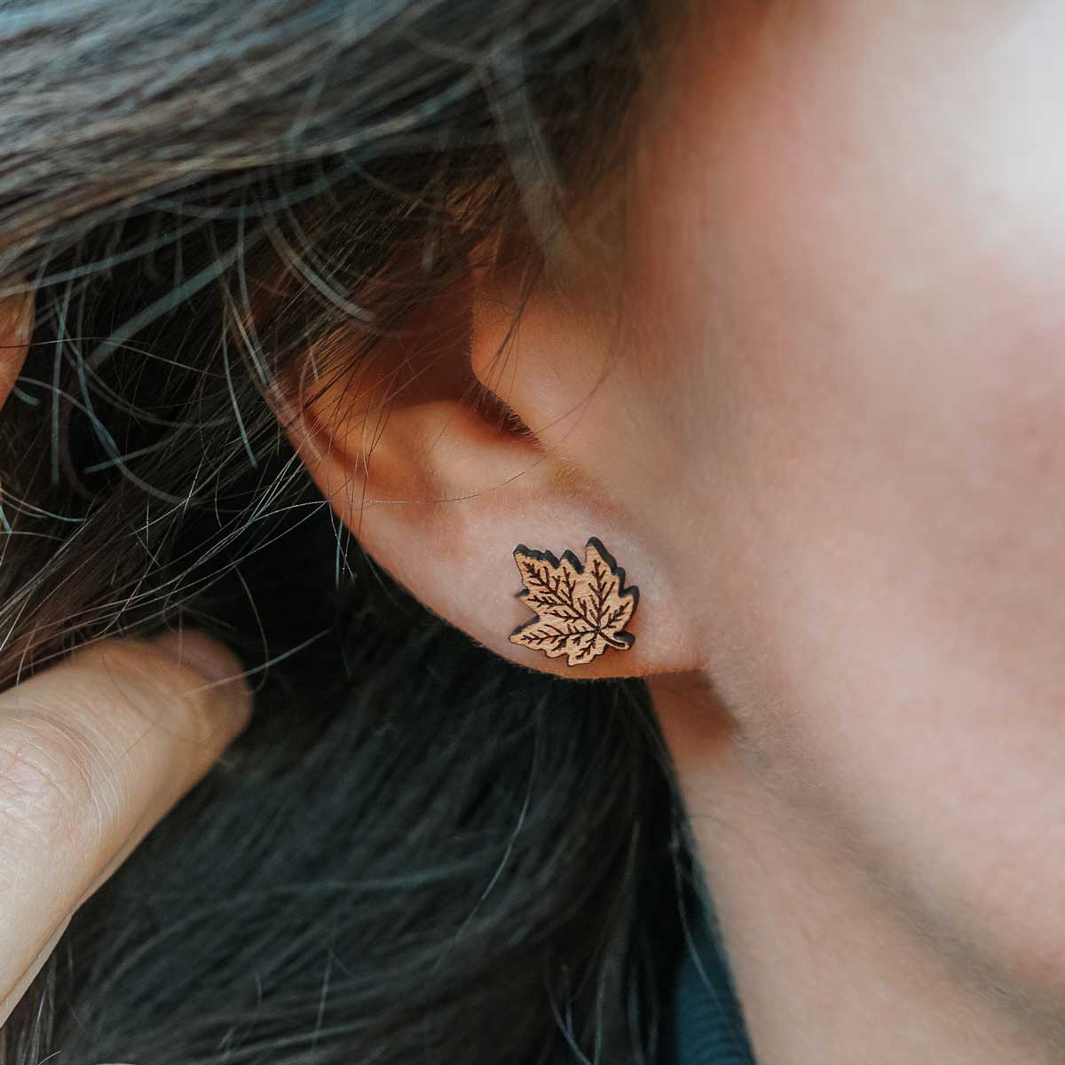 Wooden ear studs with maple leaf design