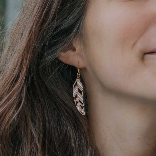 White Piuma mismatched feather wooden earrings