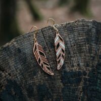 Mismatched raw and white Piuma feather wood earrings