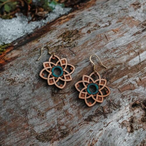 Turquoise blue Primavera wooden earrings with floral pattern