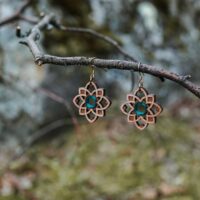 Primavera turquoise blue wooden earrings with a floral pattern