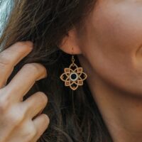 Primavera pastel green wooden earrings with a floral pattern