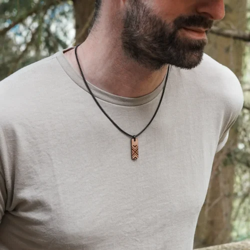 a man wearing a necklace