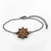 Wooden bracelet with an edelweiss design and a silver chain