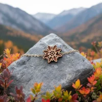 bracelet-en-bois-edel-chainette-7 Bracelet en bois au design d'edelweiss avec chainette dorée en nature