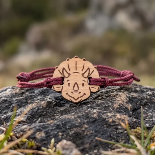 child's wooden dinosaur bracelet Customizable Swiss wooden dinosaur bracelet with burgundy cord